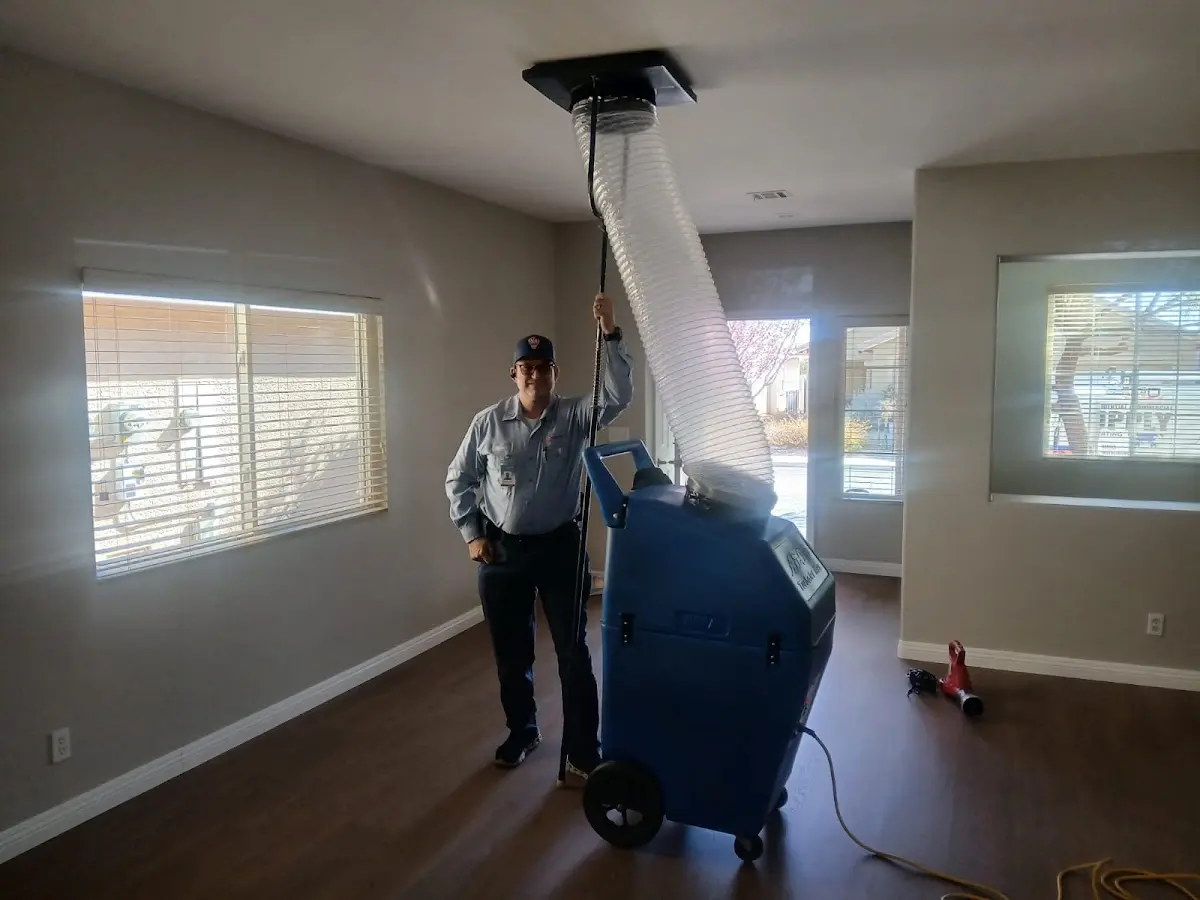 Professional Dryer Vent Cleaning work inside a Brawley home